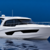 Bateau Beneteau Antares 12 Coupé en mer avec fond bleu